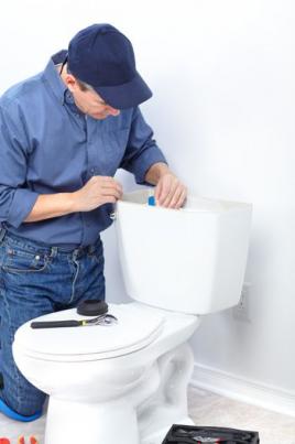 Mike is working on repairing a toilet